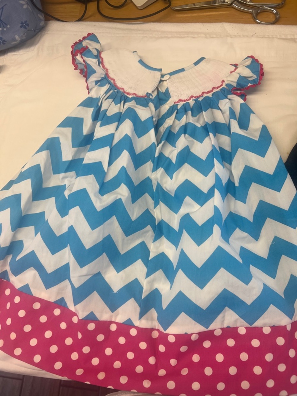 Blue Chevron Smocked Girls Dress with Pink Polka Dot Trim - Picture 6 of 7